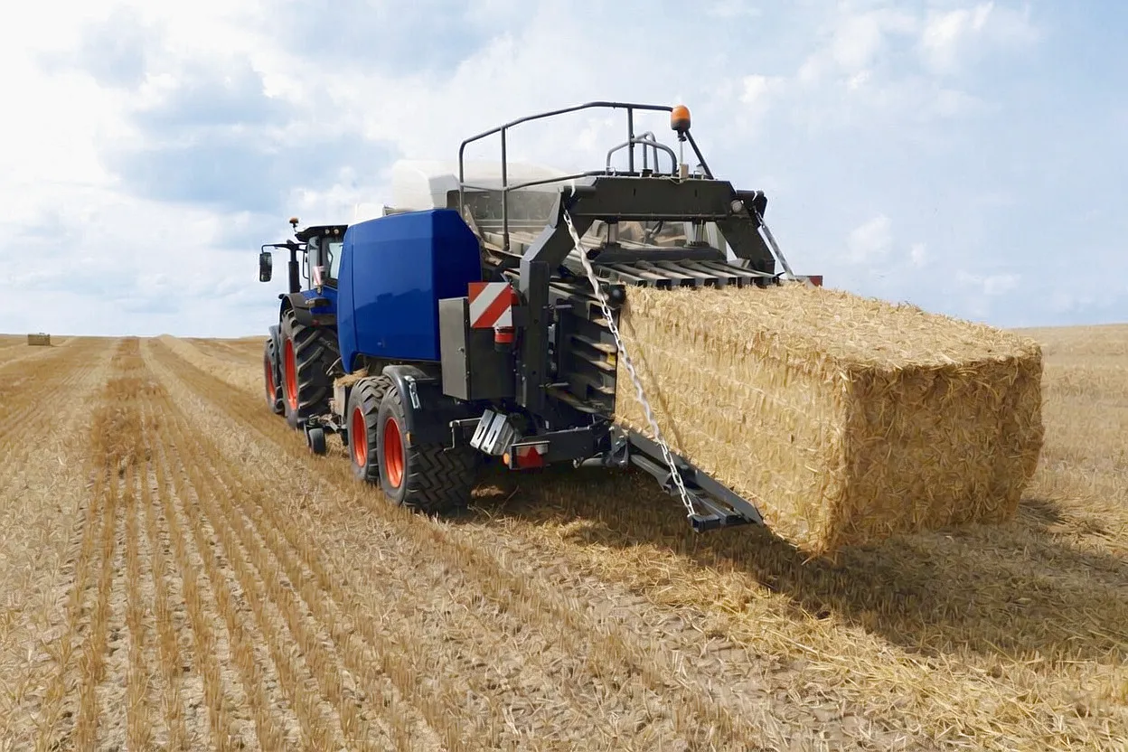 Alfalfa hay baling in UK pasture